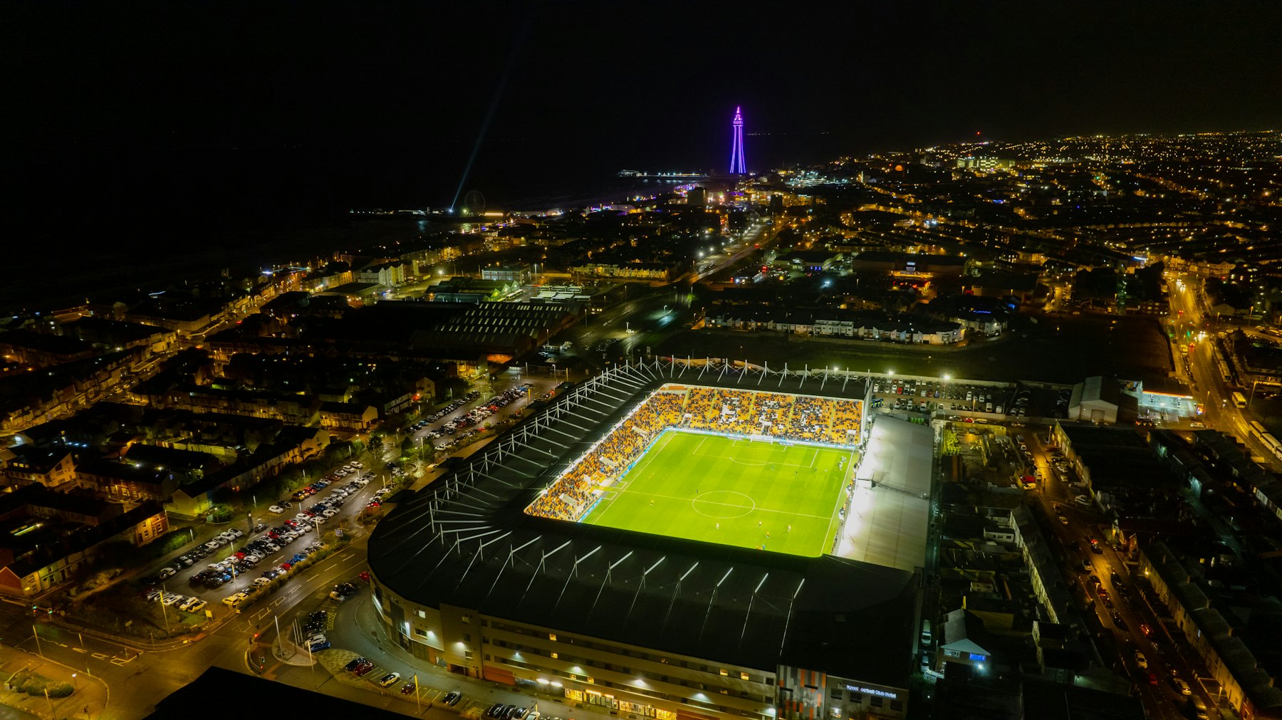 Aerial view of a football stadium at night